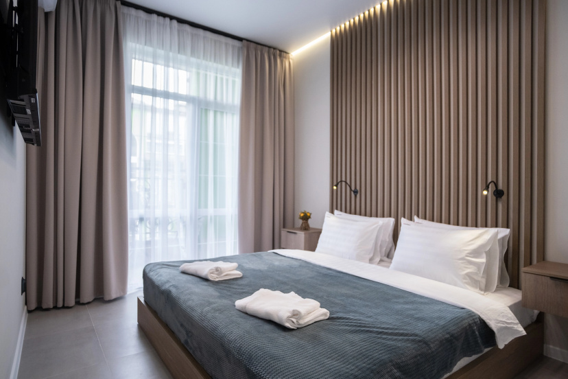 Апартаменты RED APARTMENTS Арт Лайт Сити апартамент Армстронг — забронировать отель в Сириусе