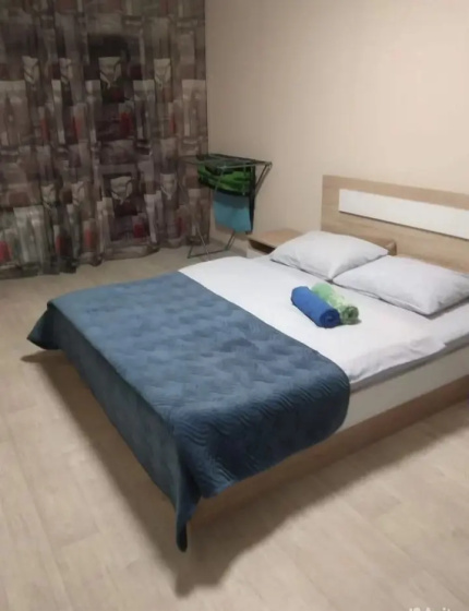 Kvartira Rooms 55 — забронировать отель в Омске
