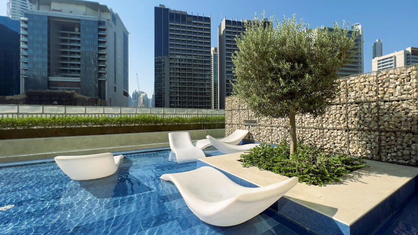 Апартаменты Keyrock Living Chic Reva 1BR with Pool Access — отель с удобным расположением в Дубае