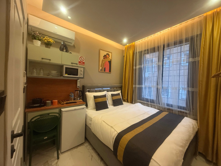 Апартаменты Warm cozy studio near the metro station — комфортный отель в Стамбуле