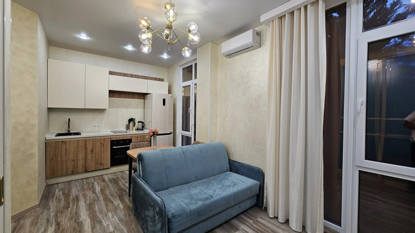 Апартаменты Уютная квартира на Лилий 13 от HomeHotelSochi — отель в Сириусе, Россия
