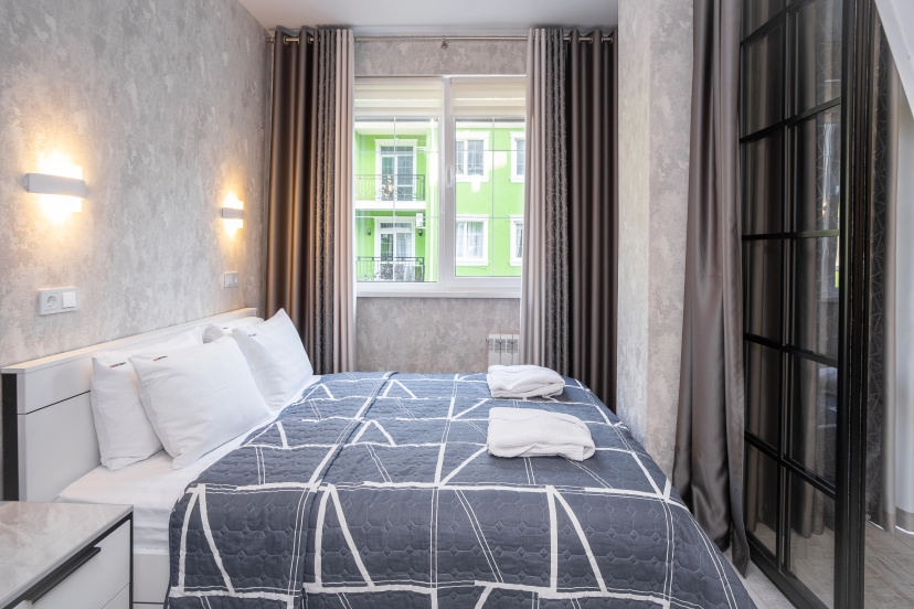 Апартаменты RED APARTMENTS Арт Лайт Сити апартамент Джойс — отель в Сириусе, Россия