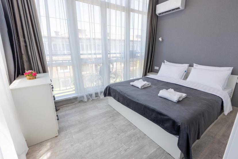 Апартаменты Red Apartments Арт Лайт Сити Грант — отель с удобствами в Сириусе