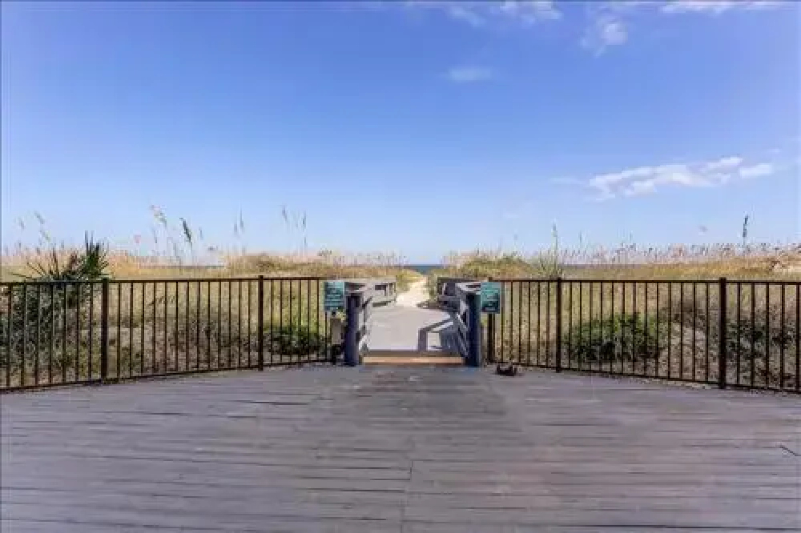 Seashore Condo with Balcony Overlooking the beach and the Atlantic by RedAwning