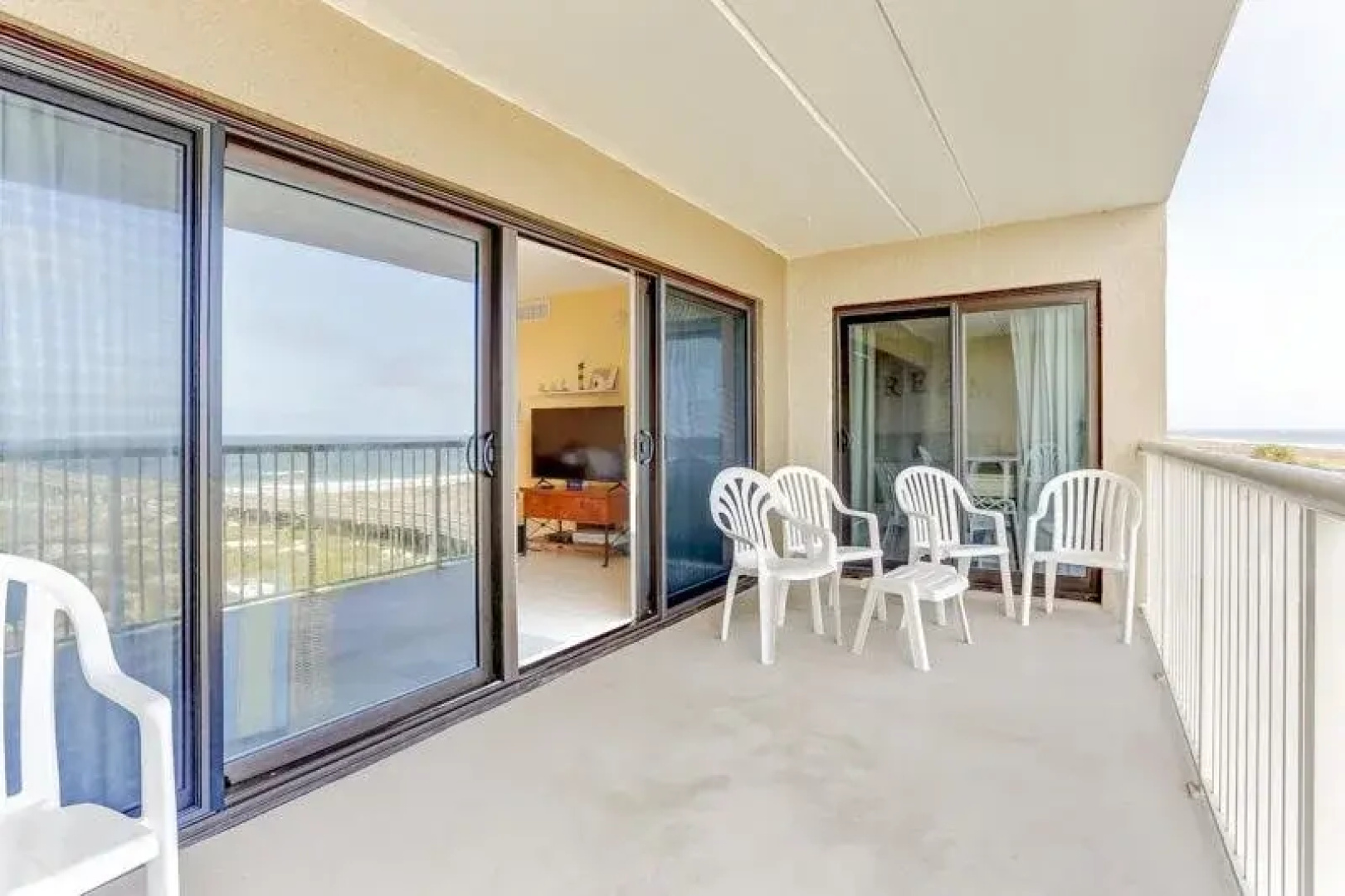 Convenience Direct Oceanfront Condo with Private Balcony by RedAwning