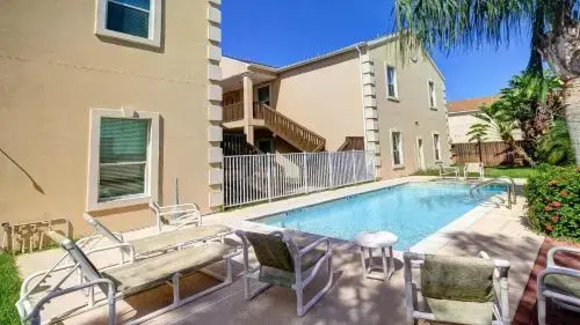 Escape Condominiums #8