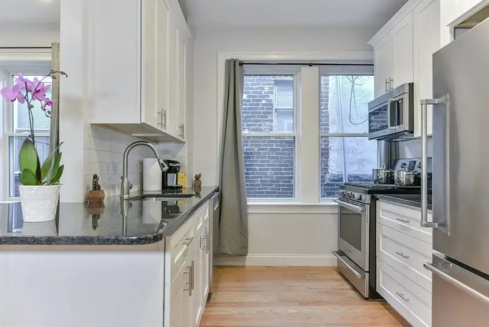 Modern 4br/2ba Condo in North End by Domio