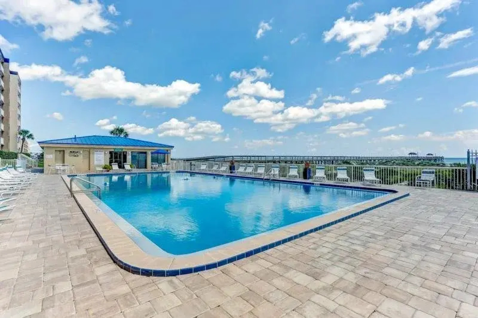 Upper unit Overlooking the Beautiful Outdoor Space and Pier by RedAwning