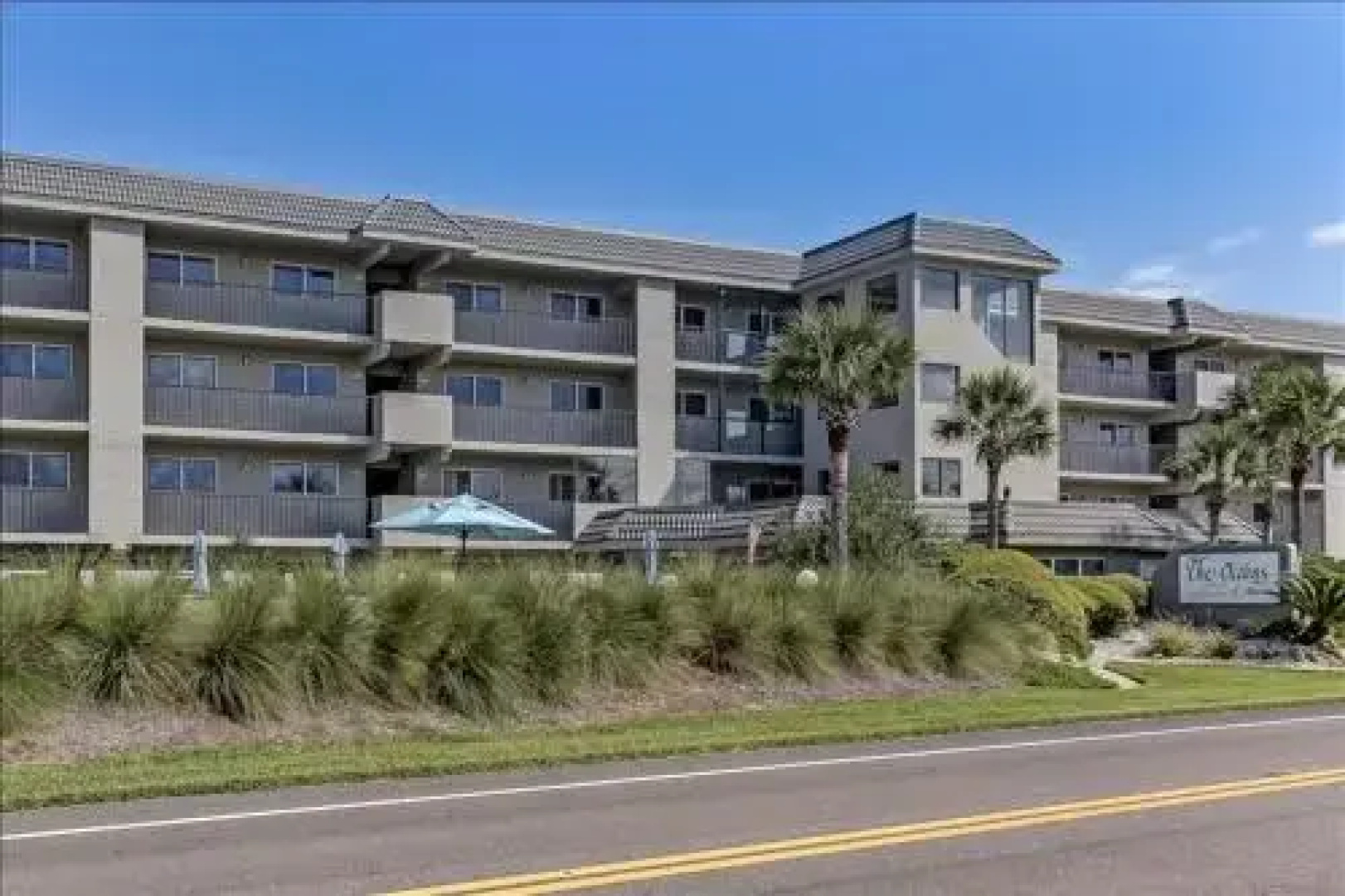 Seashore Condo with Balcony Overlooking the beach and the Atlantic by RedAwning