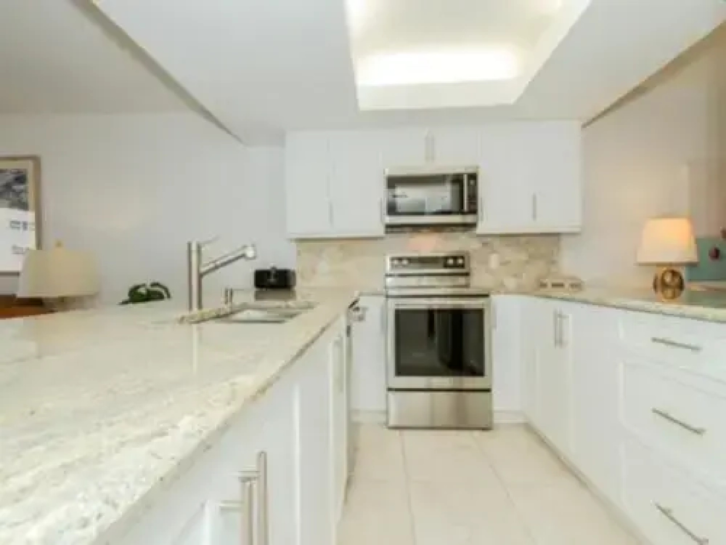 Luxurious Beachfront Condo in Prime Location with Pool and Hot Tub by RedAwning, Naples