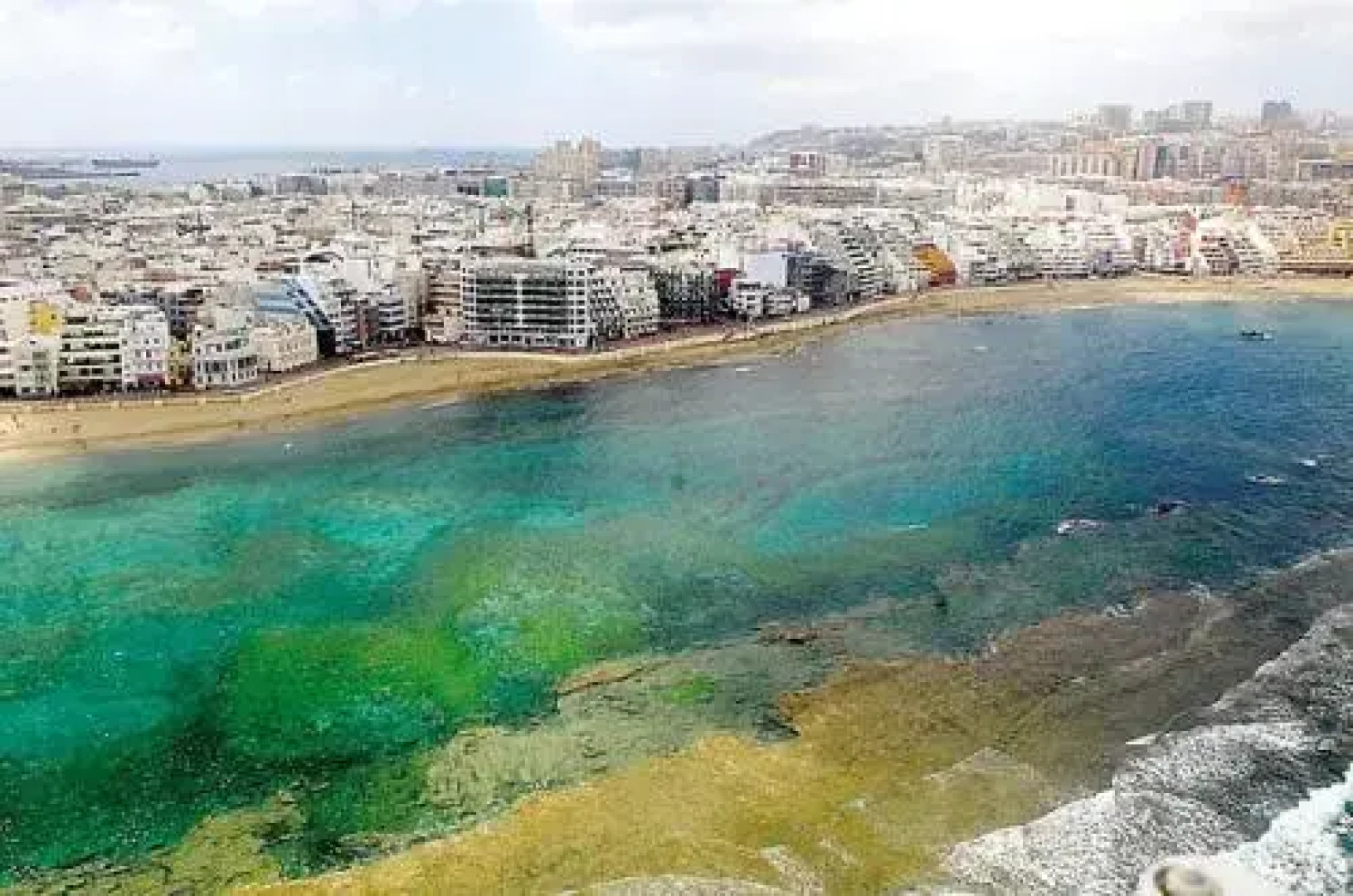 Green water at the beach
