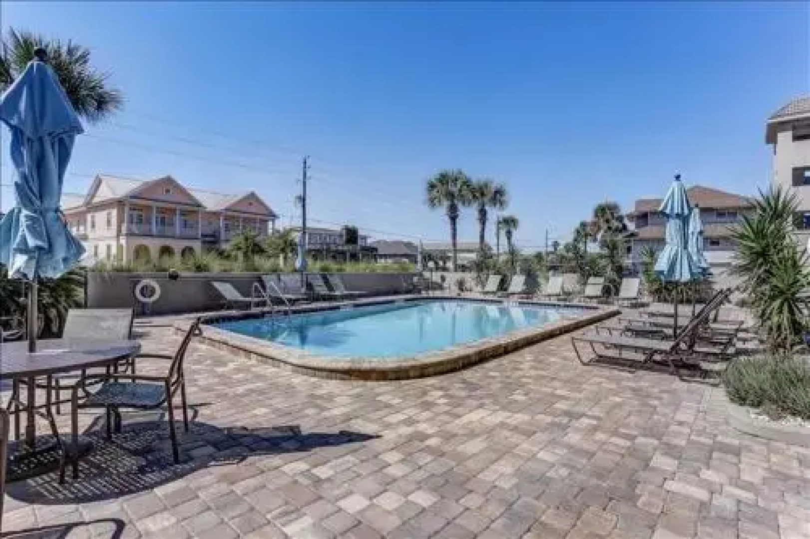 Seashore Condo with Balcony Overlooking the beach and the Atlantic by RedAwning