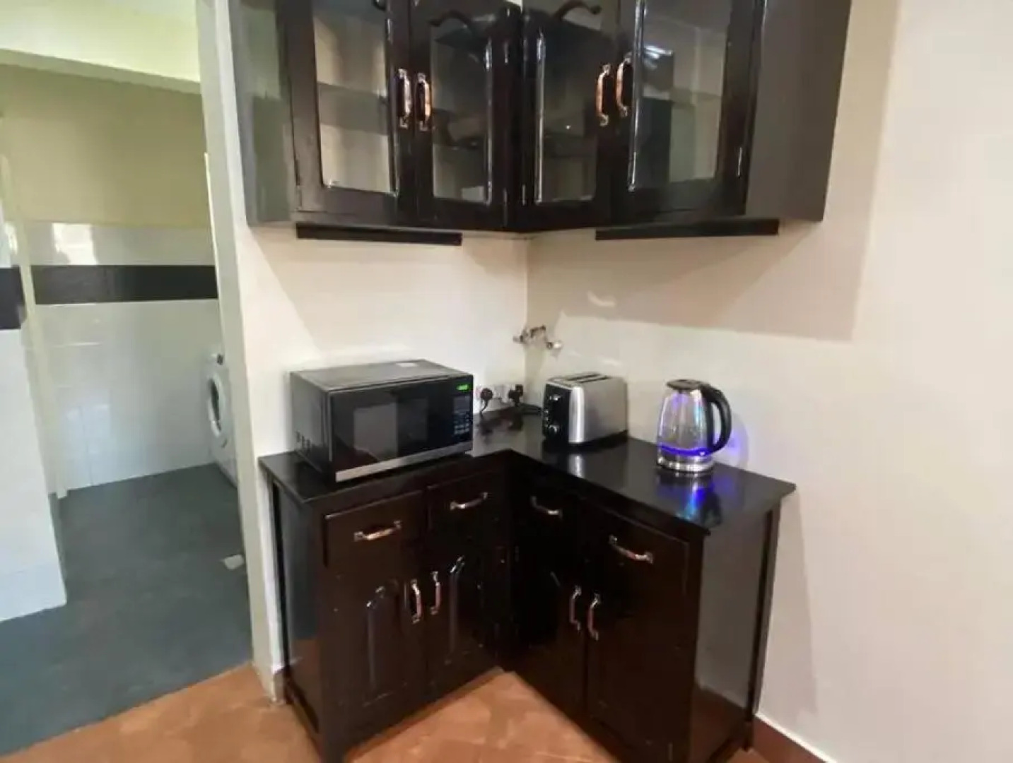 Mikocheni Studio APartment with a car