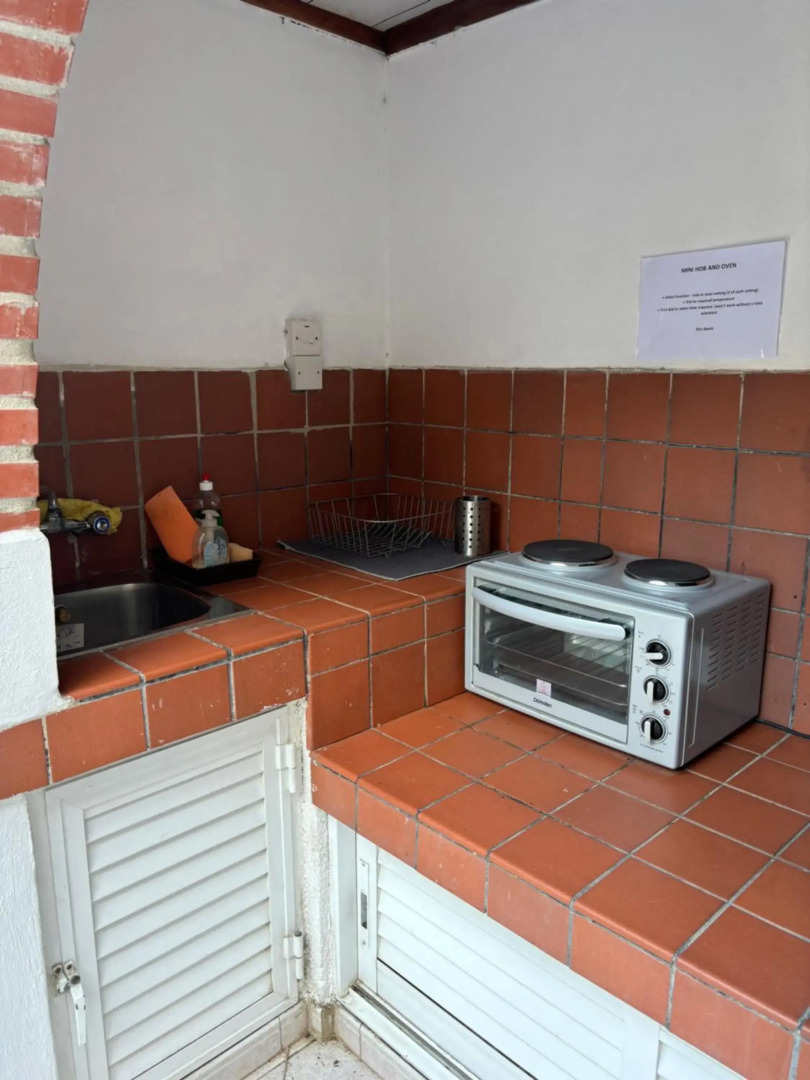 Mediterranean poolside garden cottage