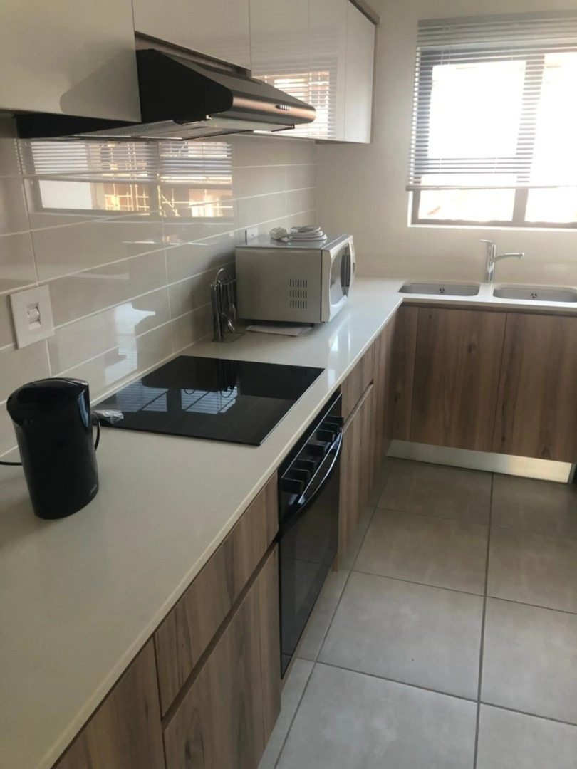 A Coastal/island experience at a Large 2 bed apartment at a Crystal Lagoon Estate.