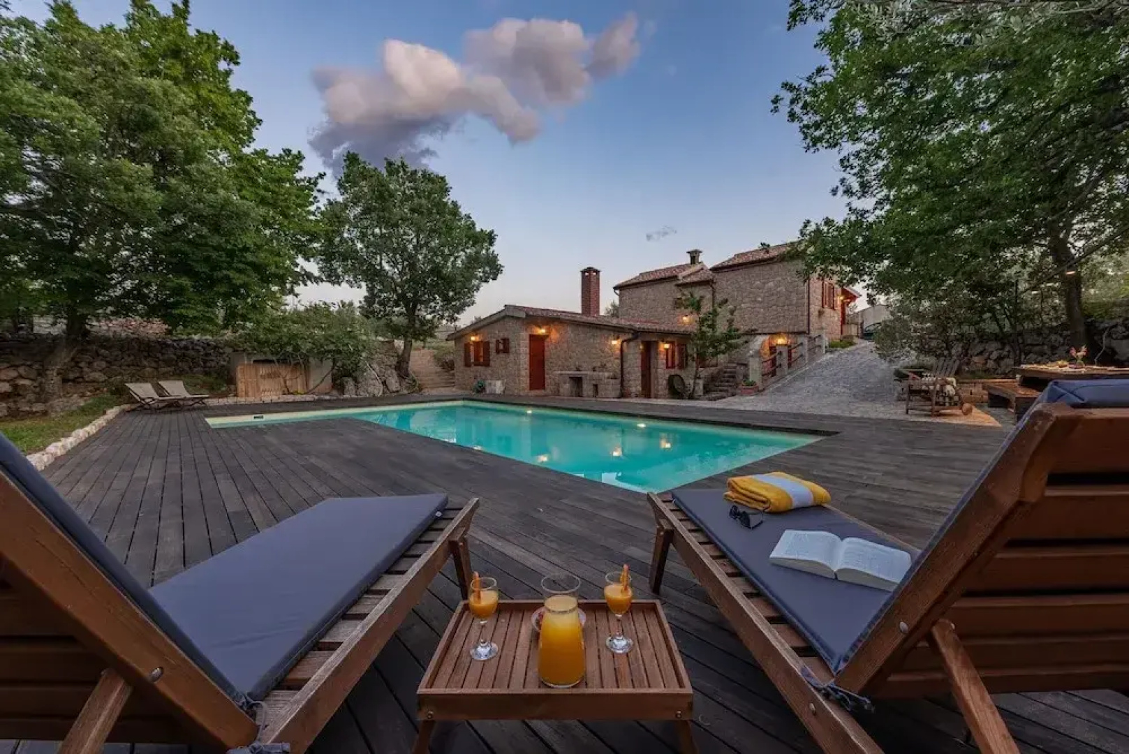 Stone house M&A with pool