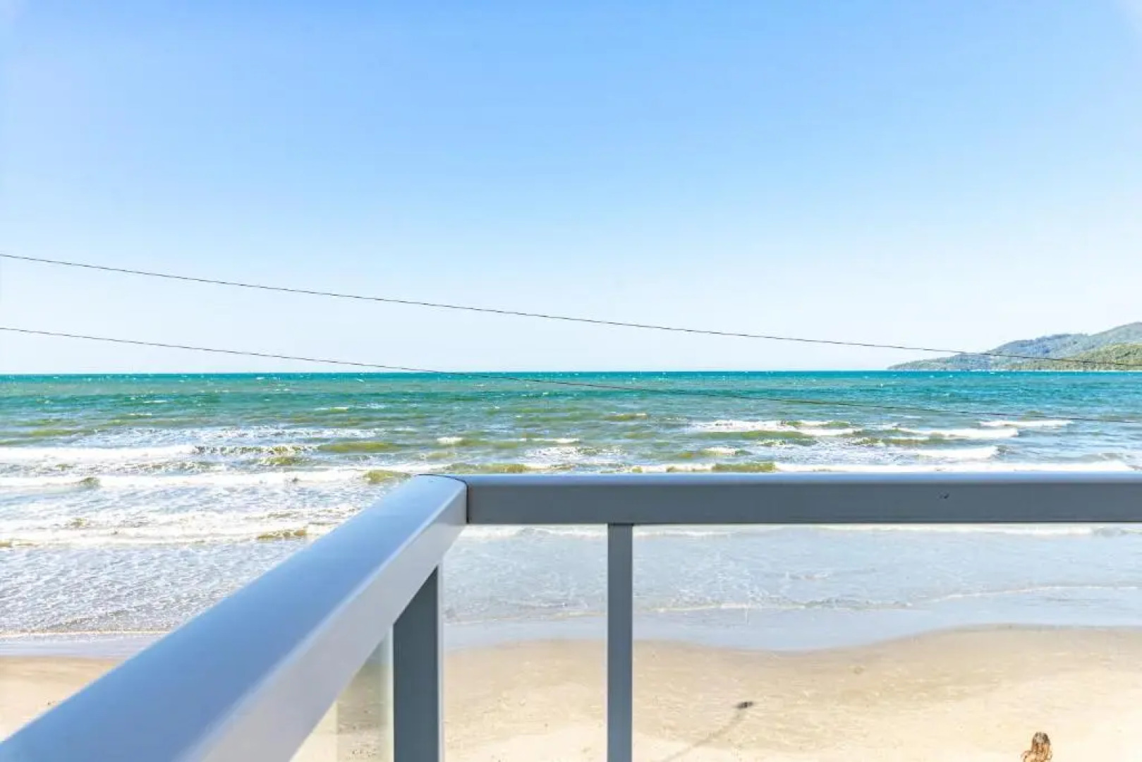 Duplex pé na areia com vista deslumbrante RAT001