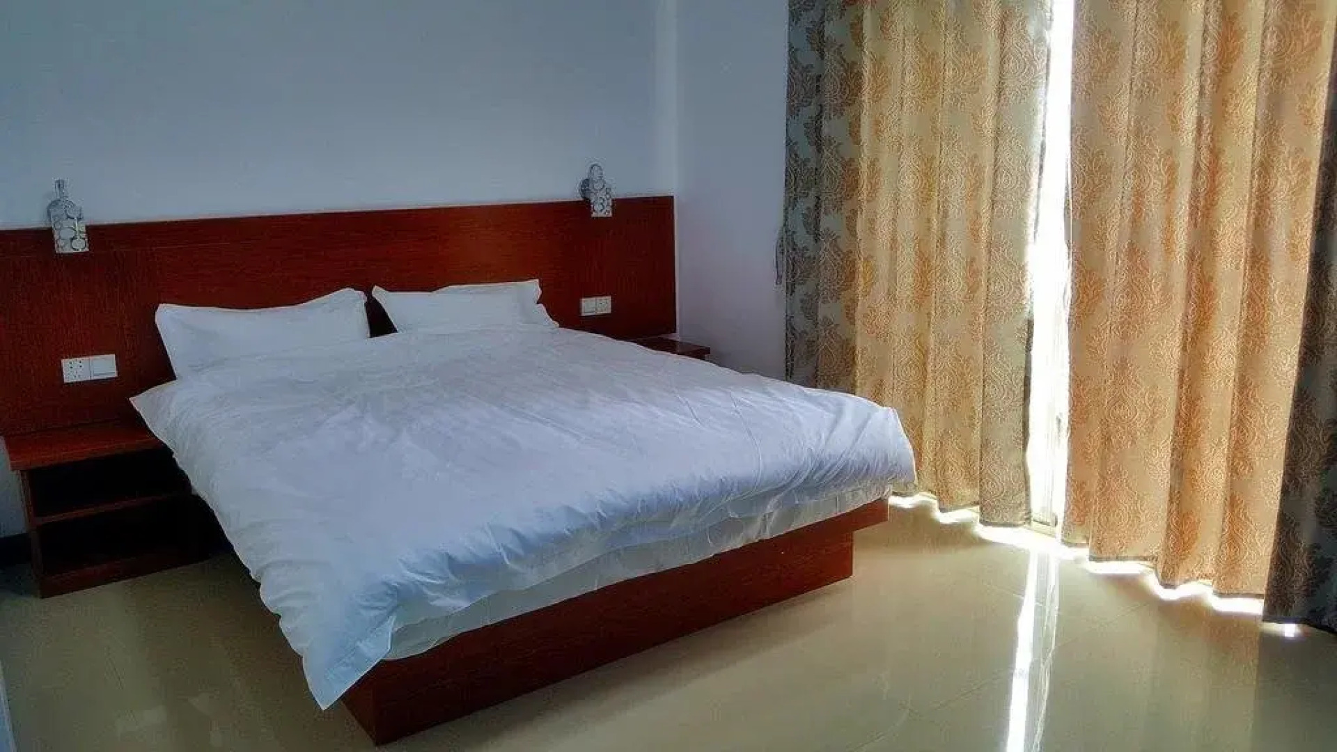 Weizhou Island Wan Jia Deng Huo Inn