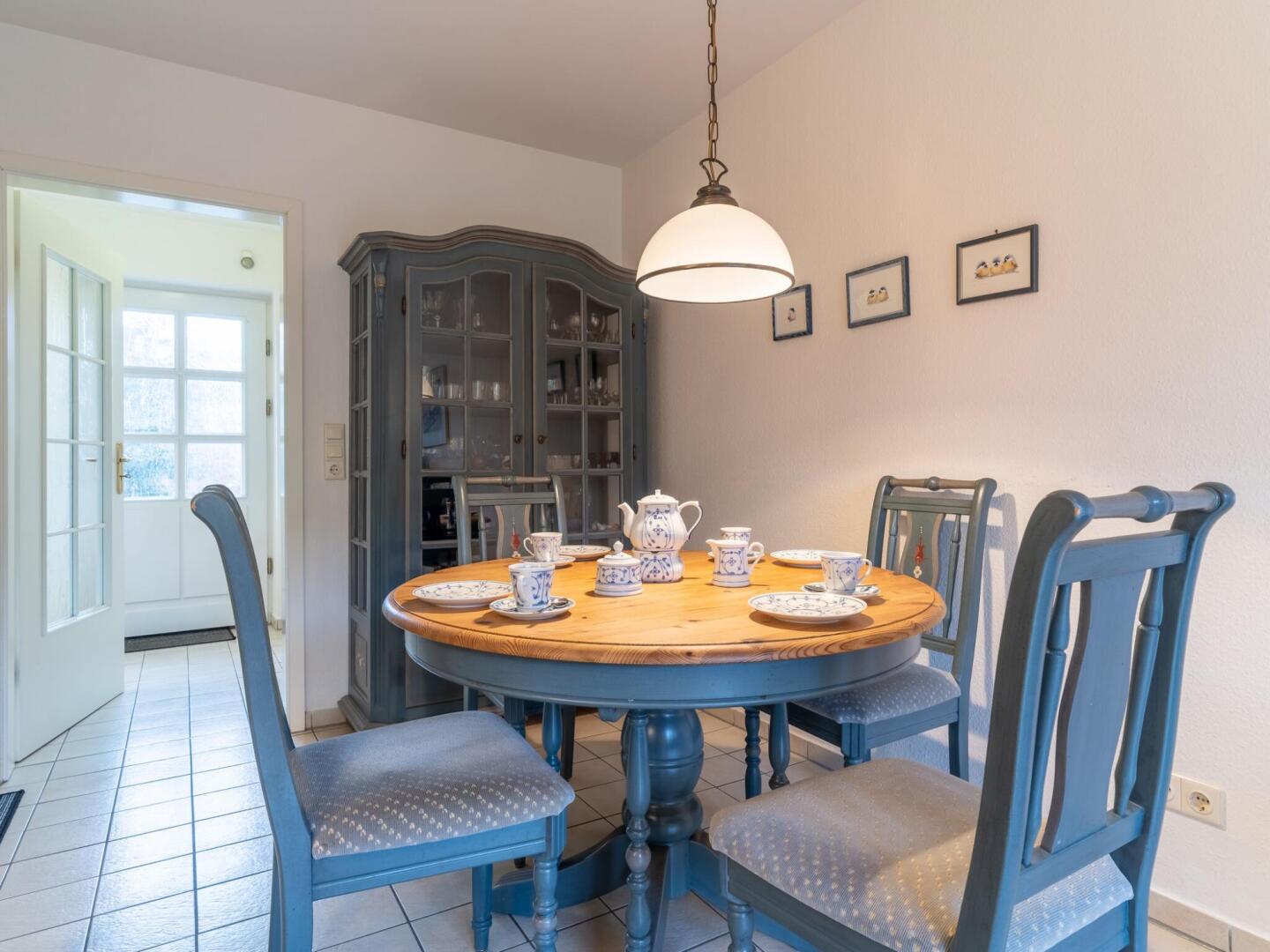 Holiday apartment with a fireplace in a thatched apartment house