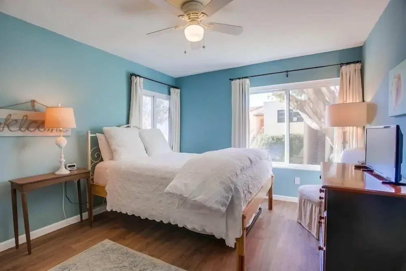 Coastal Chic Furnishings Condo Steps to Beach SBTC 128 by RedAwning