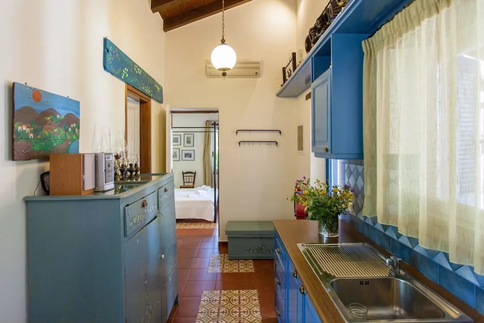 Dine on the Generous Veranda at a Rustic Stone Getaway