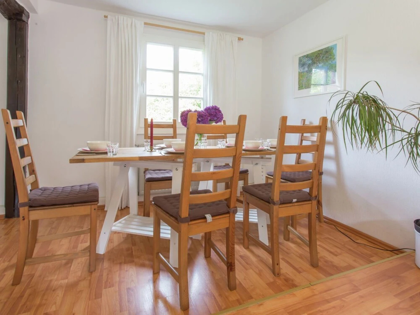 A Lovely Watermill Surrounded by Delightful Greenery