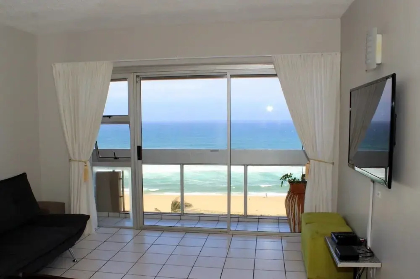 A Breath-taking 180 Degree Beach View Right From Your bed or Lounge