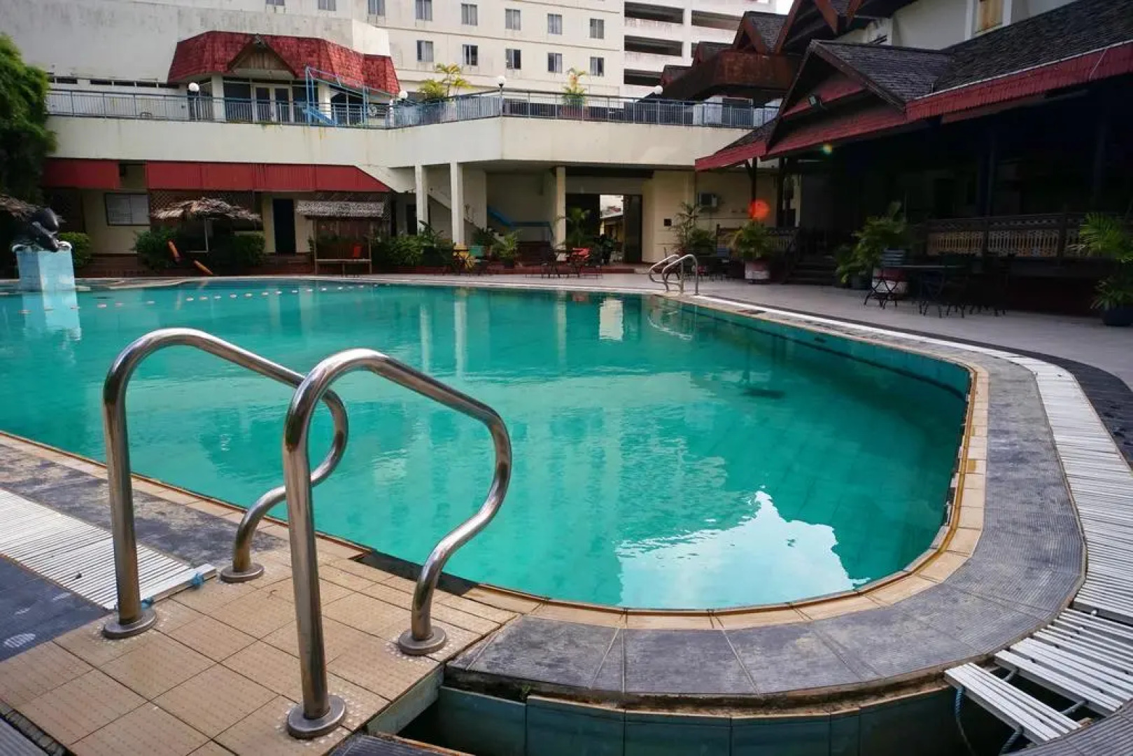 Capital O 1963 Hotel The New Benakutai