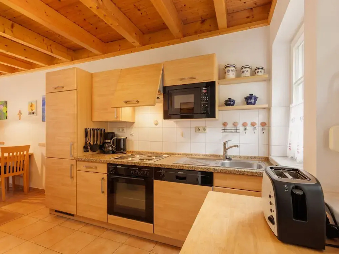 Cozy Holiday Home with Wood Burning Stove near Water