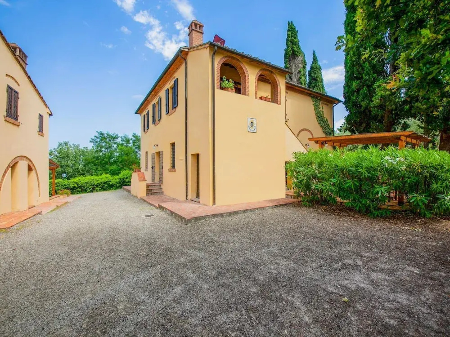 small village of beautiful apartments in the green Tuscan hills and olive groves