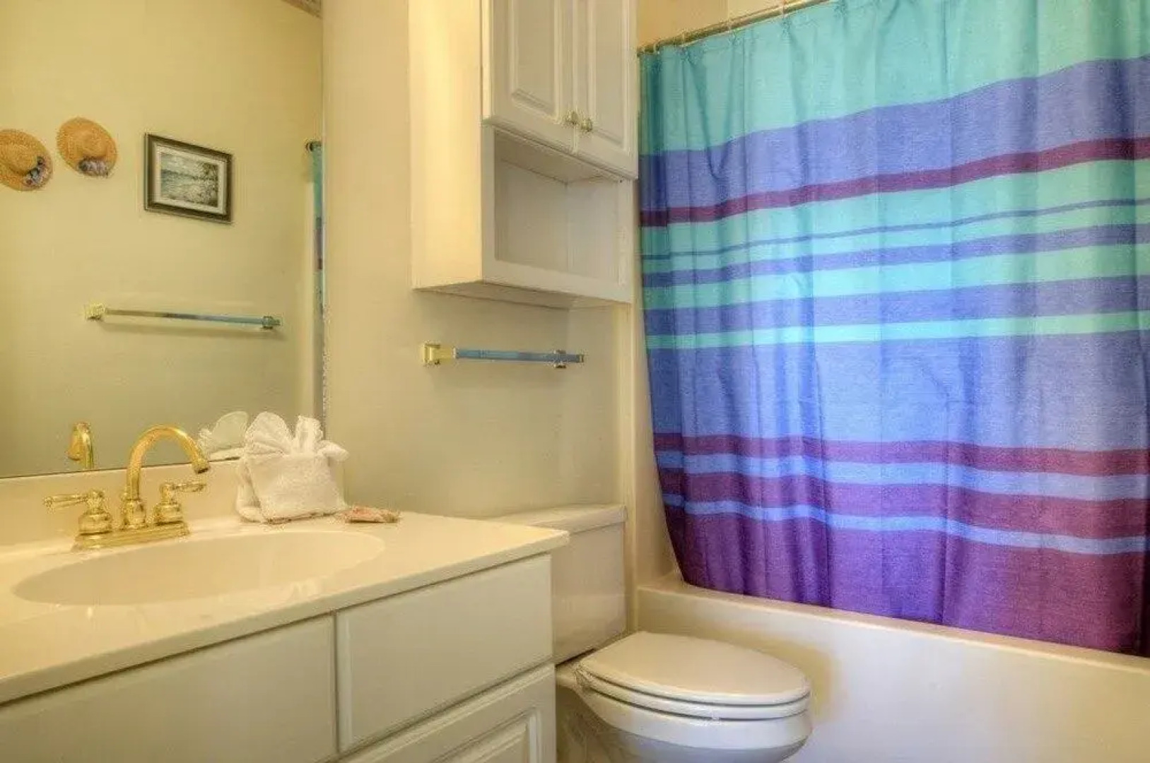 Magnolia Place 102 4765 2 Br condo by RedAwning