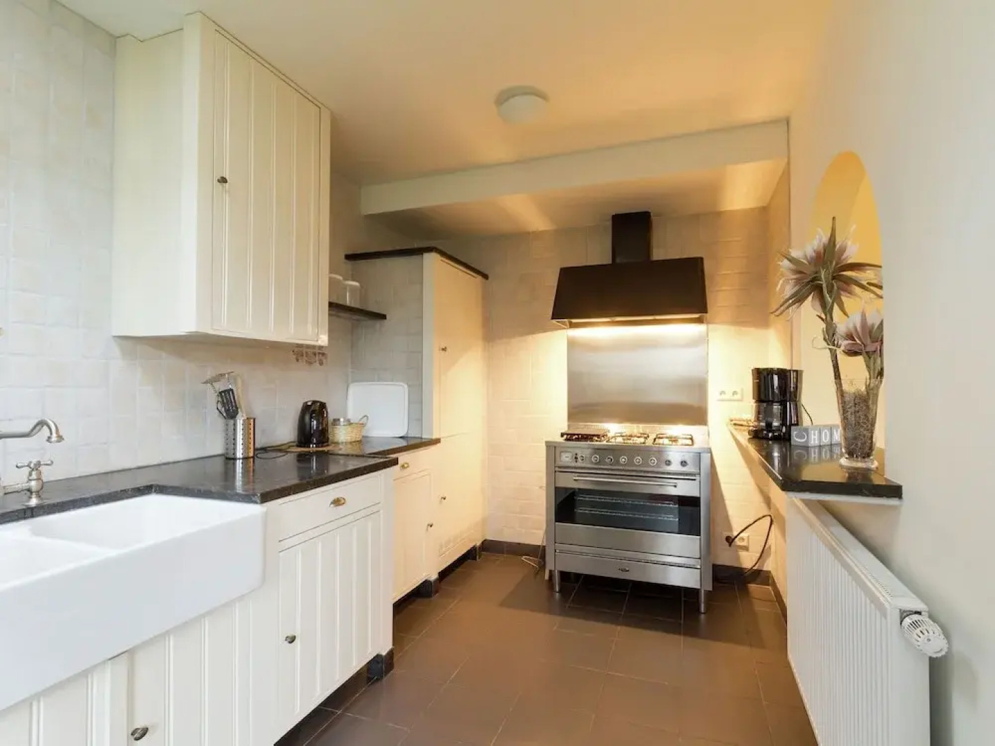 Cozy decorated house with fireplace, surrounded by forest