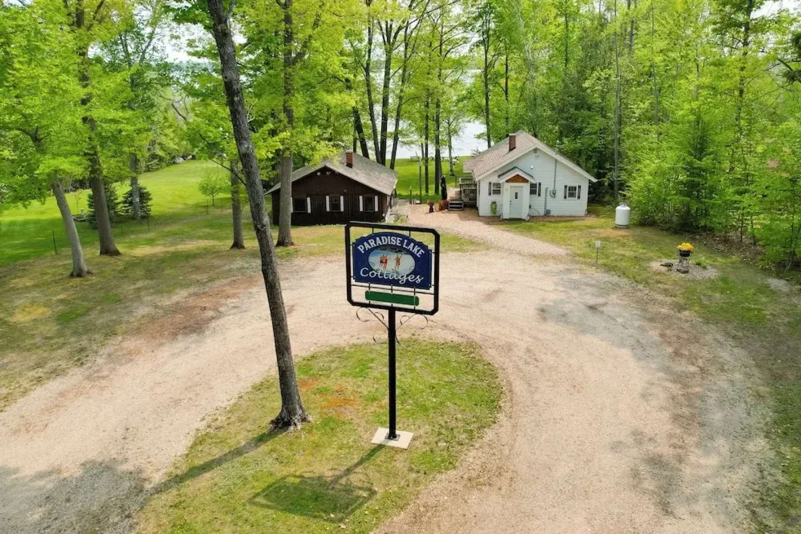 Cozy Carp Lake Cottage w/ Dock, Kayaks & Fire Pit