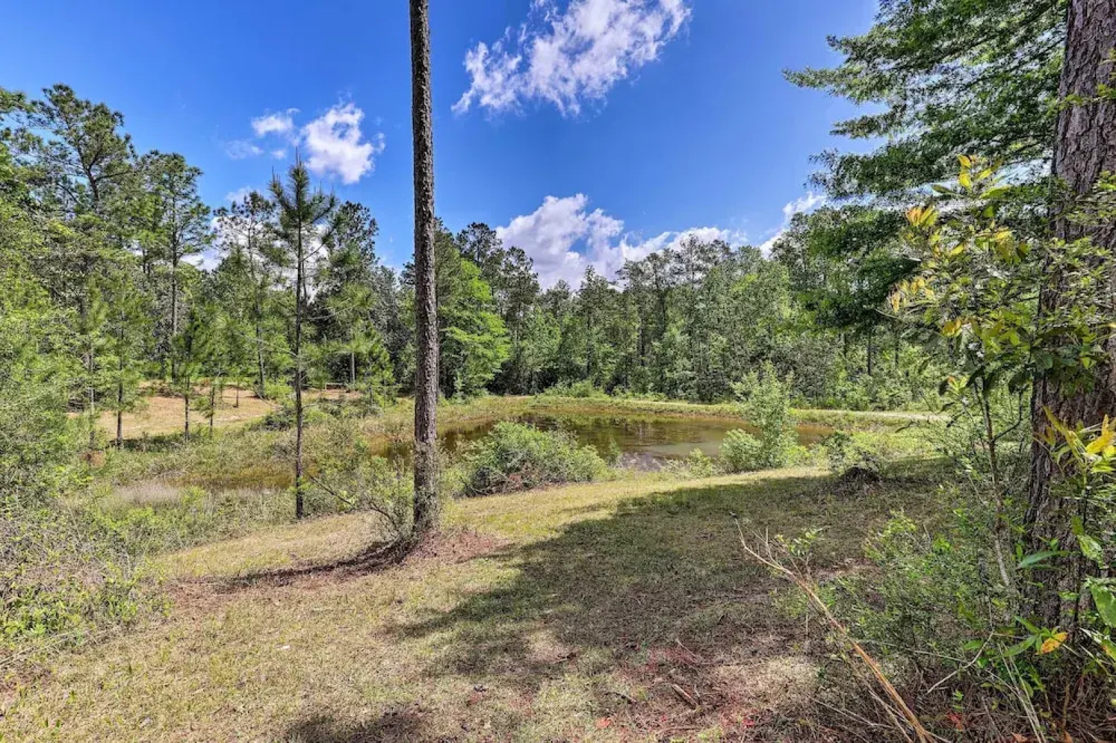 Secluded Cabin w/ Pond ~ 37 Mi to Gulf Coast!