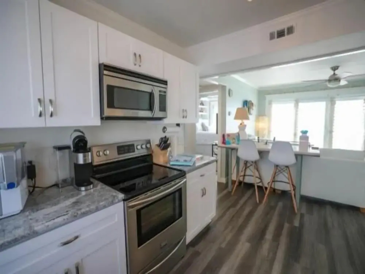 Beach Sunrise - Relaxing and Romantic! Enjoy ocean views from the bedroom with balcony access. 1 Condo by RedAwning