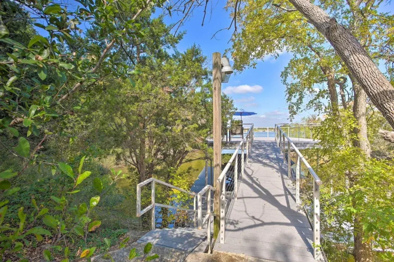 Lakefront Living: Private Dock, Deck, & Game Room!