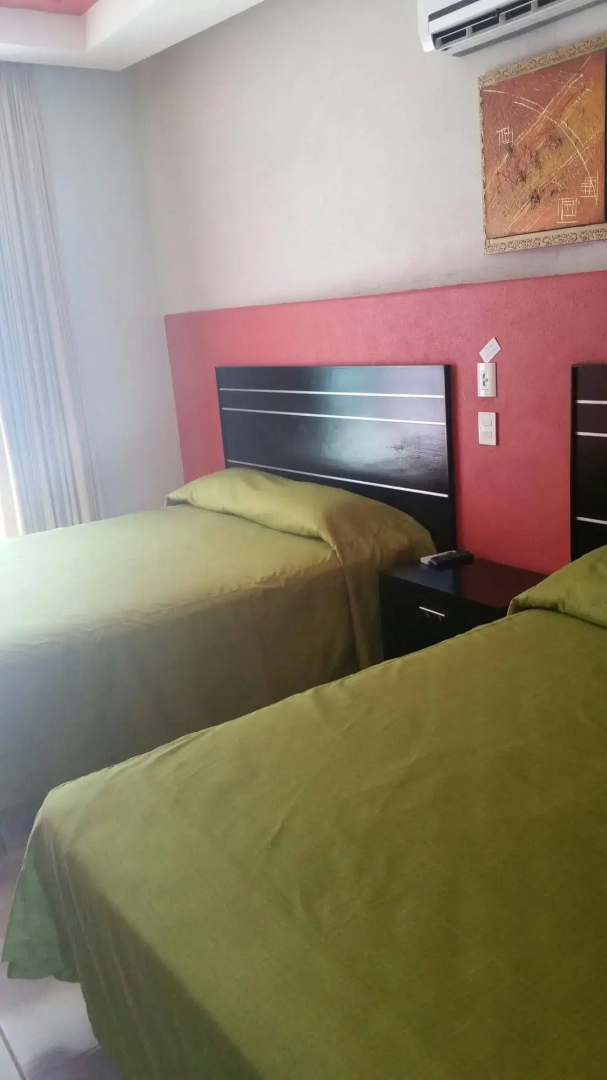 Hotel y Suites Los Encantos