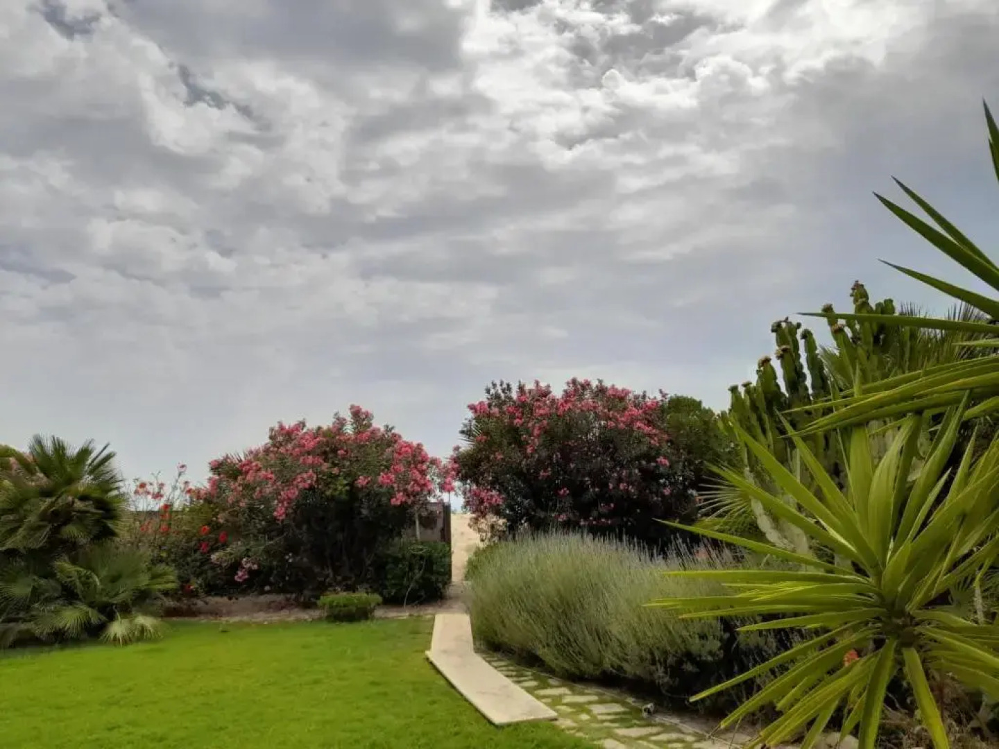 Appartamento con giardino con accesso a mare