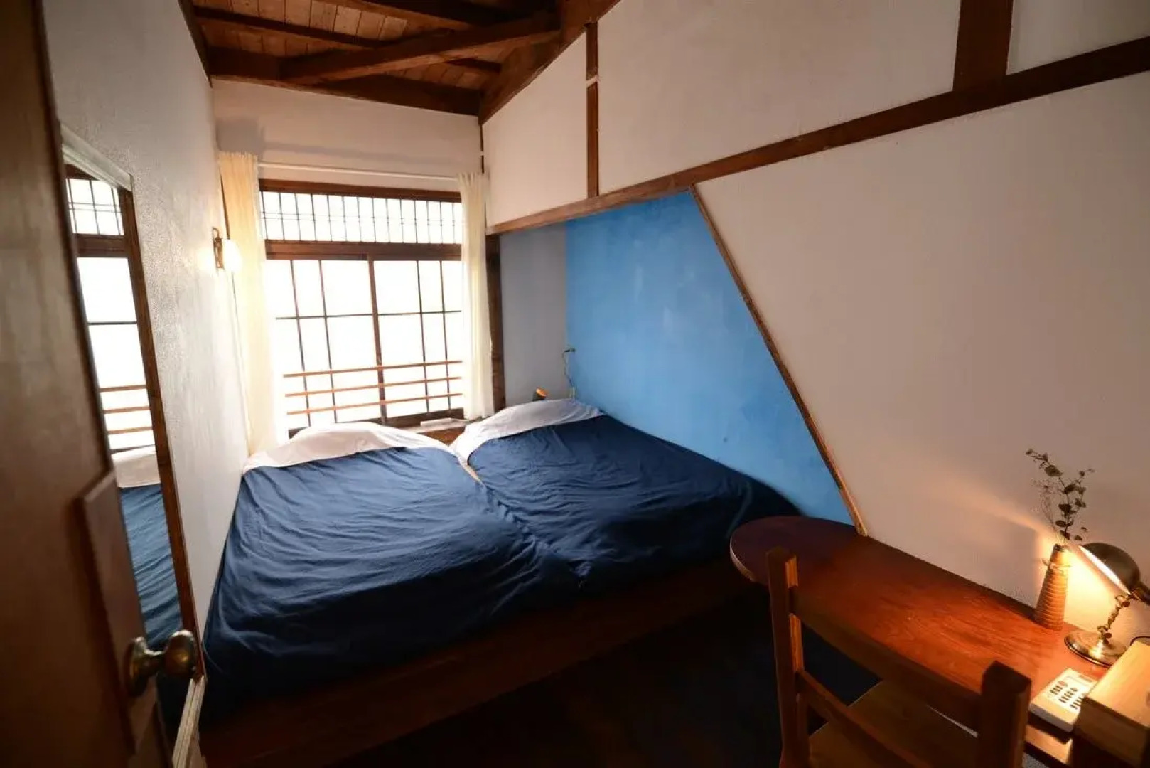 Taketa station hostel cue