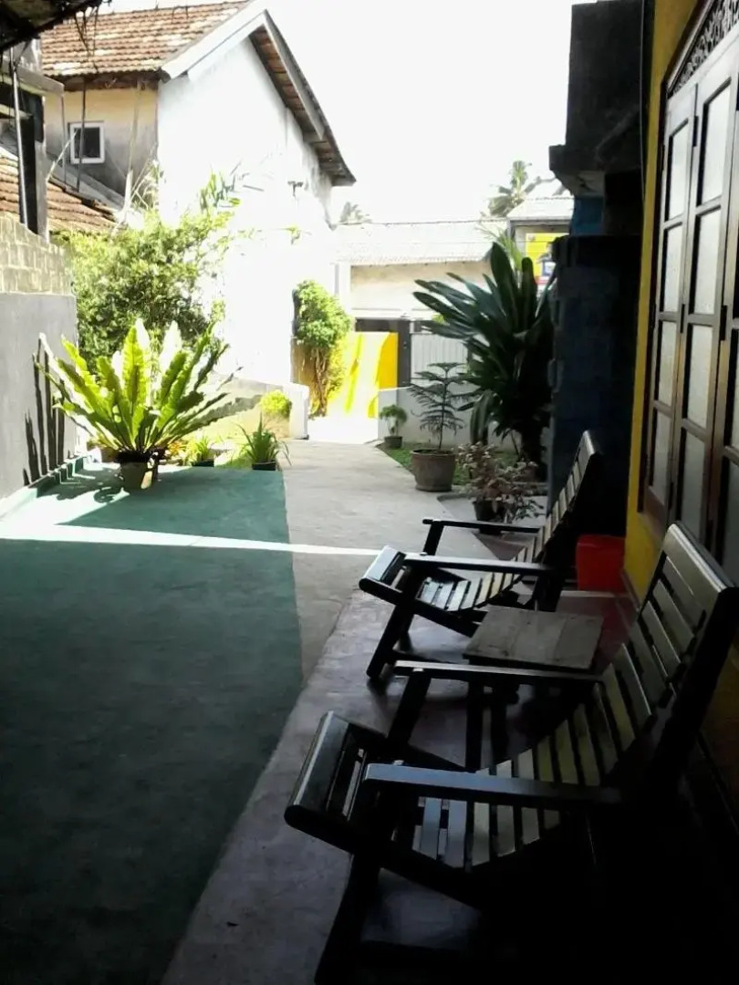 Malika's Yellow House