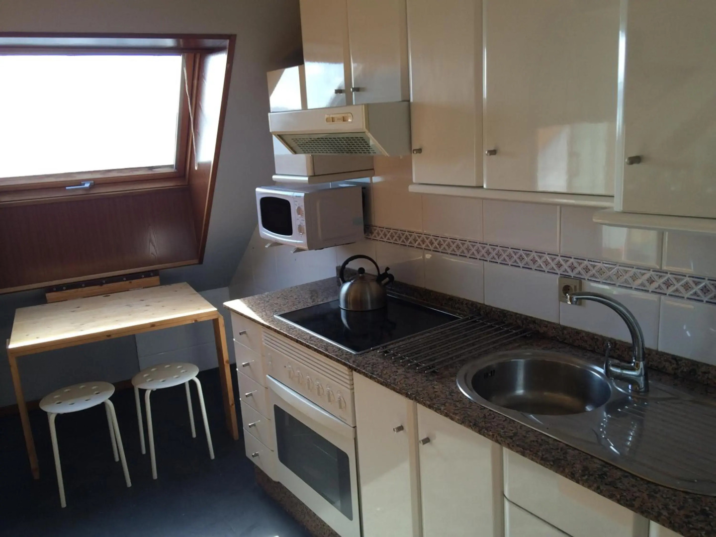 Attic loft to wake up by the sea.