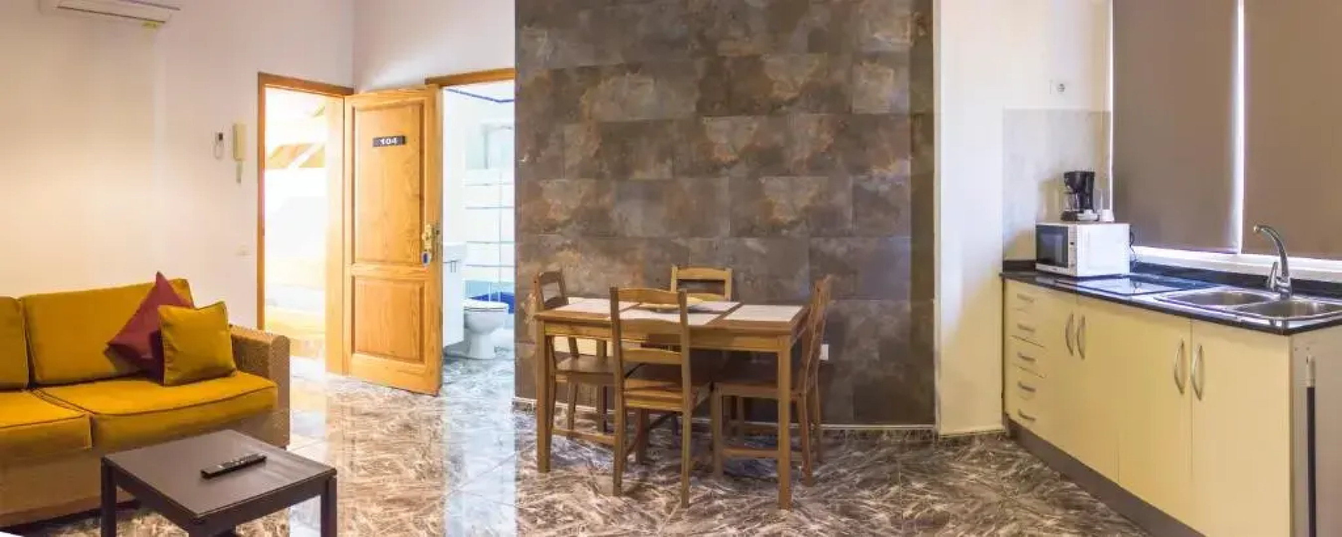 Apartamentos La Aldea Suites