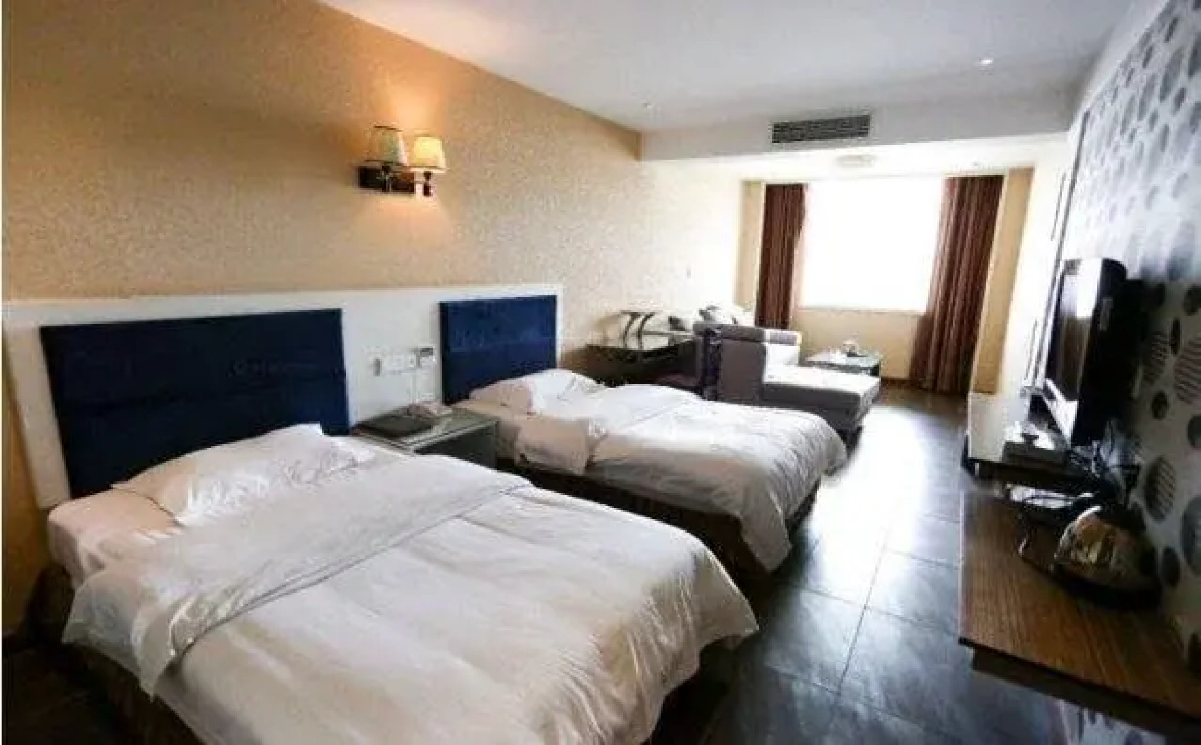 Yanting Jinxin Business Hotel