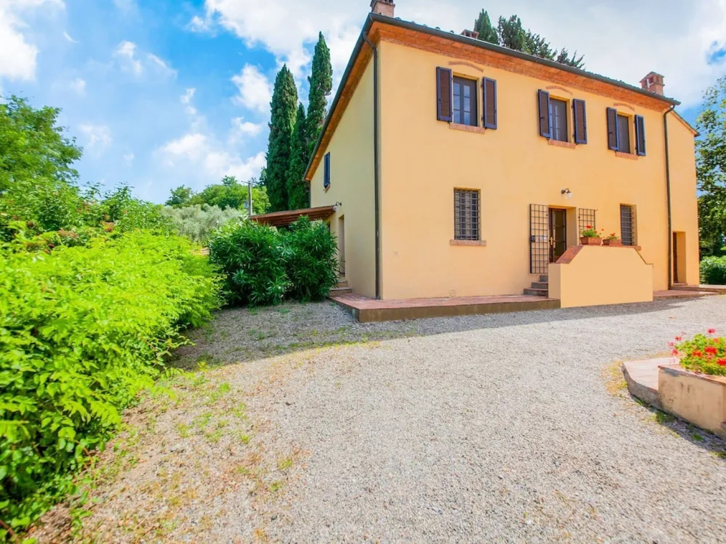 small village of beautiful apartments in the green Tuscan hills and olive groves