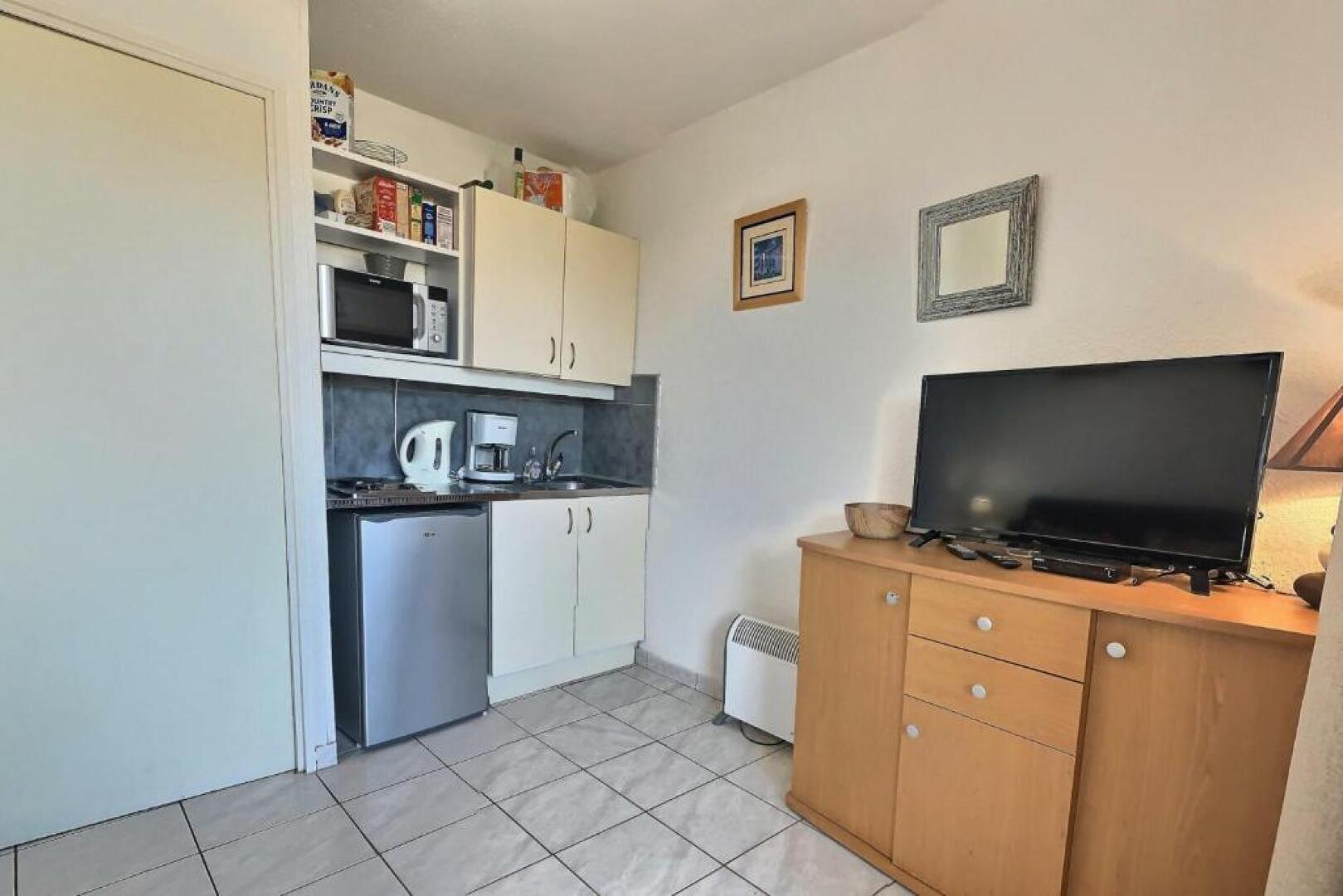 Studio cabine pour 4 personnes avec piscine commune