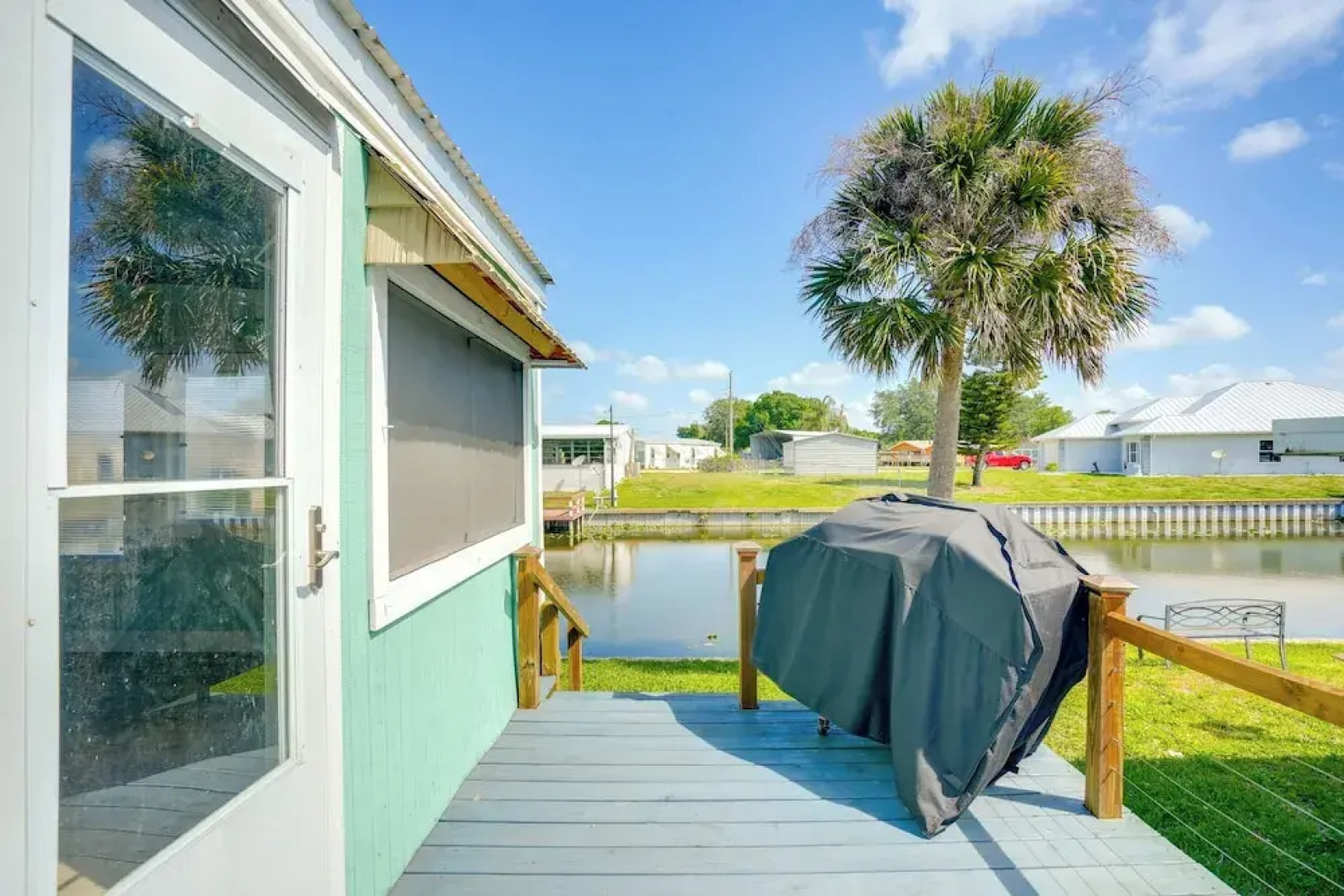 Boat & Fish: Canal-front Home on River