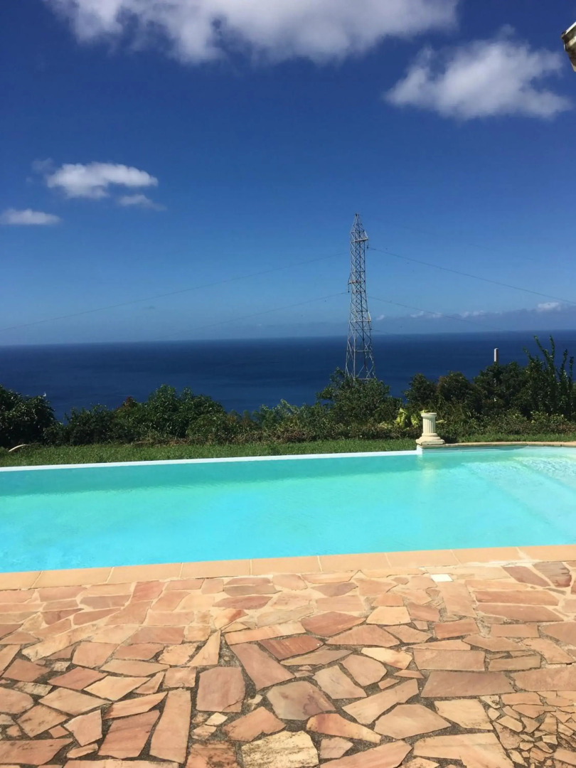 Villa de 3 chambres avec vue sur la mer piscine privee et jardin clos a Le Carbet a 2 km de la plage