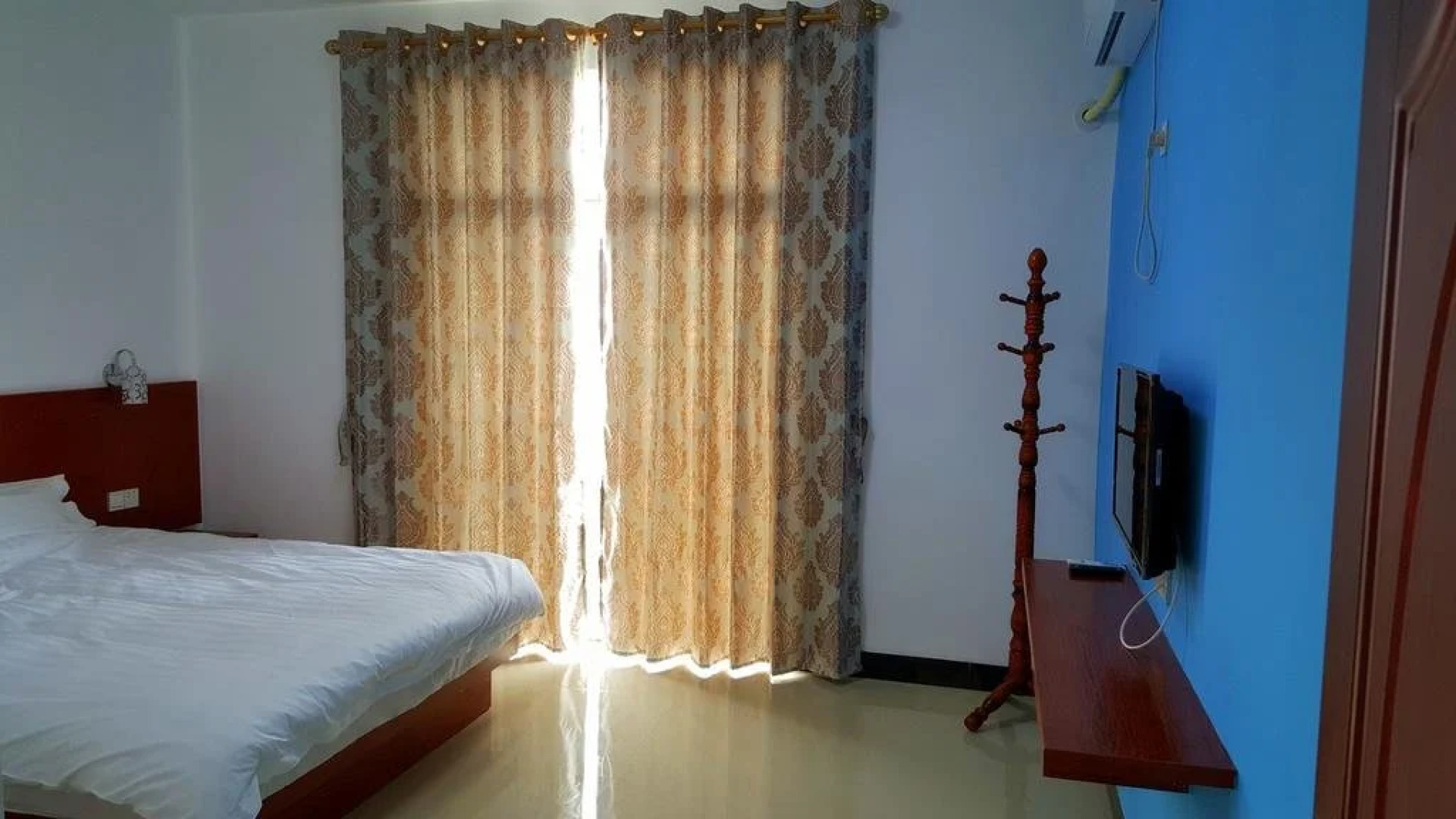 Weizhou Island Wan Jia Deng Huo Inn