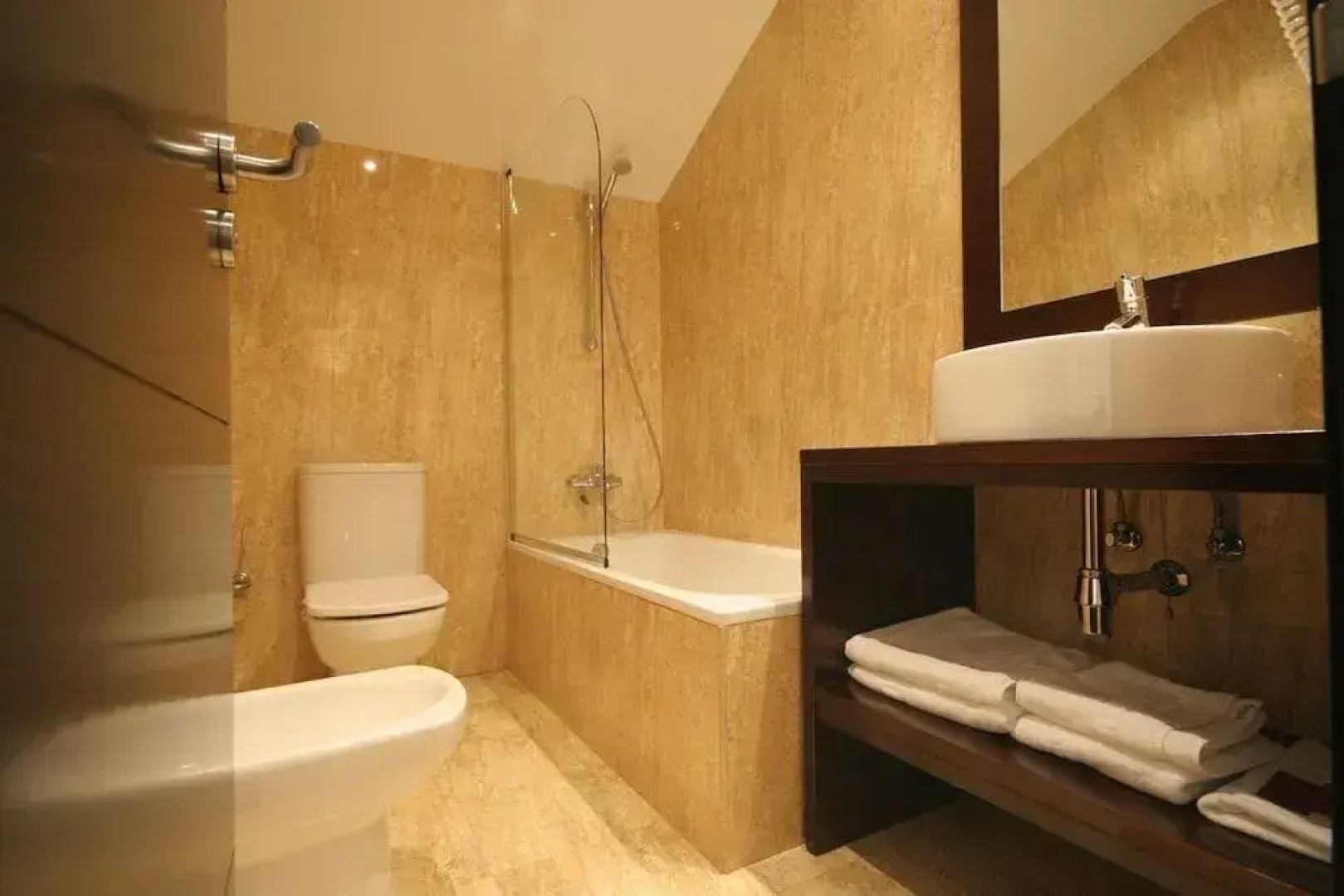 Hotel Asador H.M. Versus