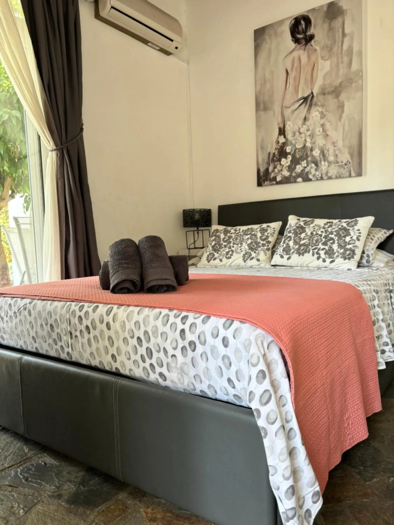 Mediterranean poolside garden cottage